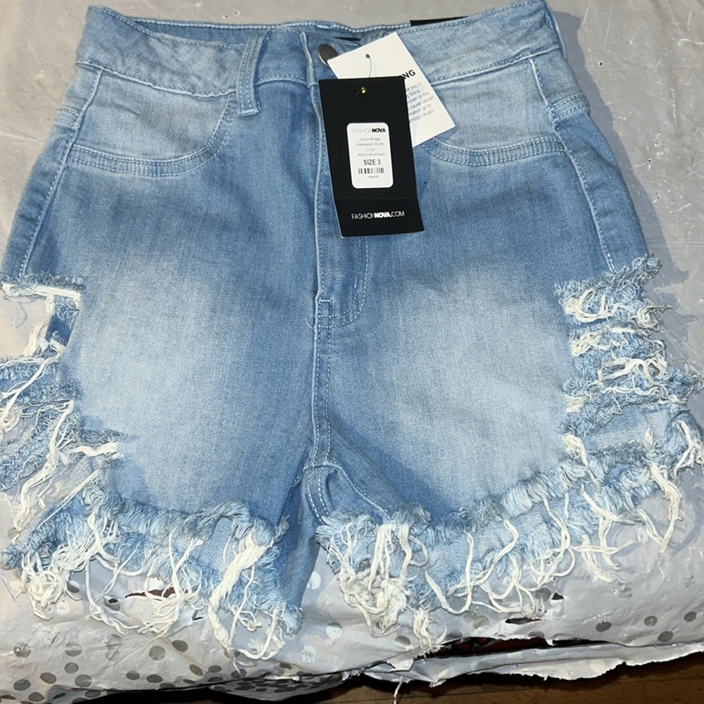 Fashion Nova distressed Jean shorts size 3 was $34.99 now only $18